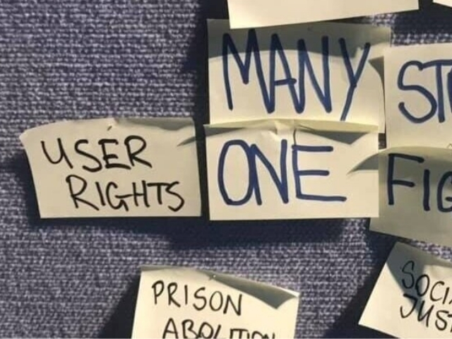 Post it notes pinned to a board with text reading 'user rights: many struggles one fight'.